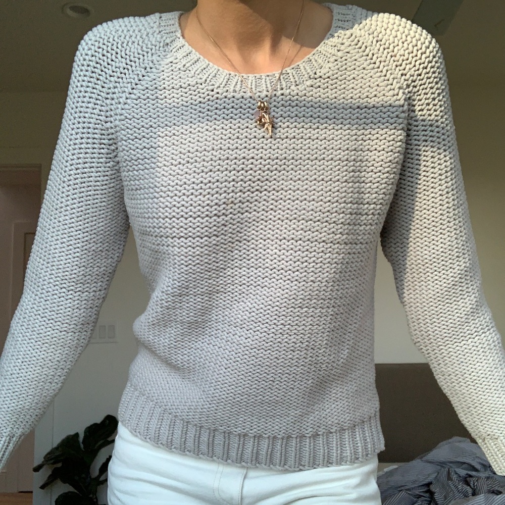 Grey sweater with unique stitch back